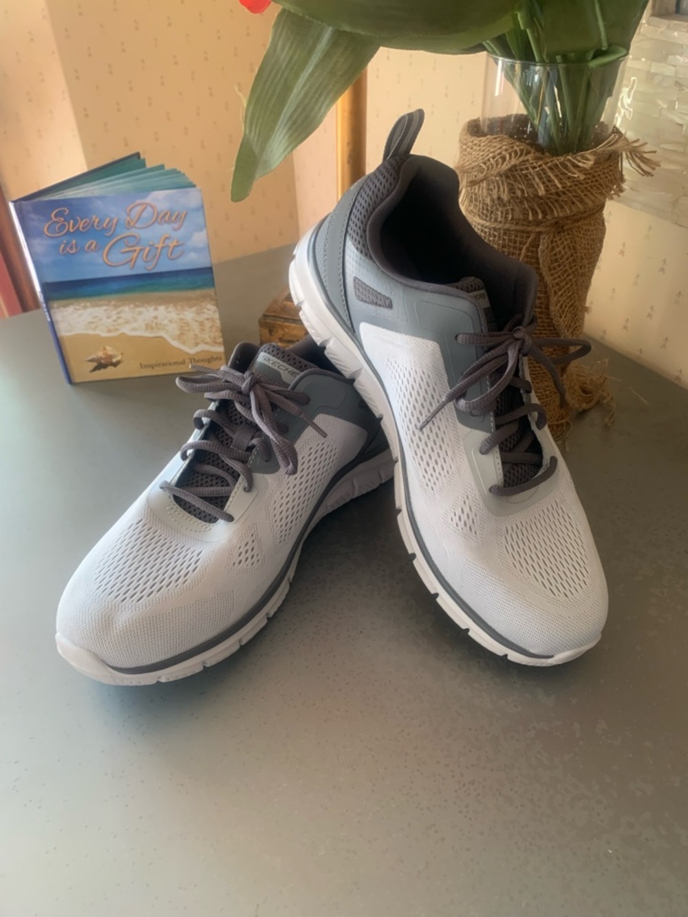 Sketcher’s NEW NEVER WORN Men’s Track or Walking lace up athletic shoes.